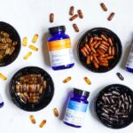 건강 챙기기, 내 식탁에서 시작된다…일상 속 ‘똑똑한 영양 & 보충제’ 활용법 blue and white plastic bottle beside brown round ashtray